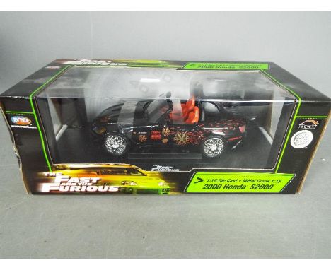 Joyride - A boxed 1:18 scale Joyride The Fast And The Furious Honda S2000. The model appears in Mint condition, the box has a