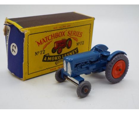 Matchbox - A boxed Matchbox #72 Fordson Tractor. The model 50 mm in length in blue with grey front and back tyres with orange