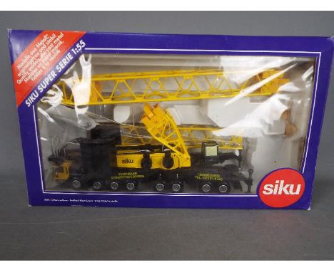 Siku - A boxed Siku #4310 1:55 scale Latticed Mast Crane. The model appears to be in Mint condition but appears to be missing