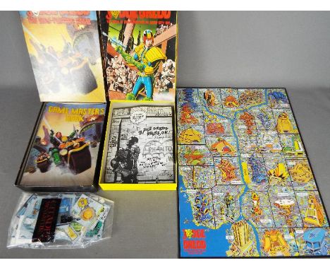 Games Workshop - Two boxed 'Judge Dredd' board / role playing games. Lot includes Judge Dredd The Role-Playing Game; and Judg