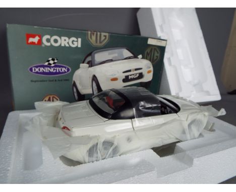 Corgi - A boxed Corgi 1:18 scale diecast #95100 MGF in white. The model appears to be in Mint condition sat in Mint internal 