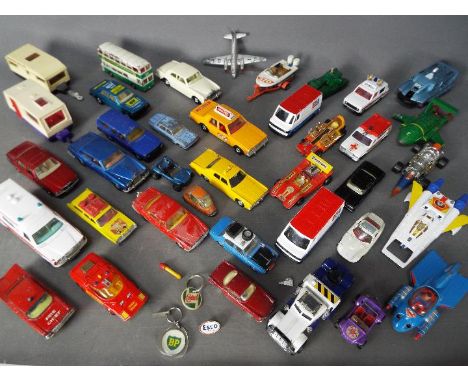 Corgi - Dinky - Matchbox - A lot of over 30 loose diecast vehicles in various scales including Dinky Spectrum Pursuit Vehicle