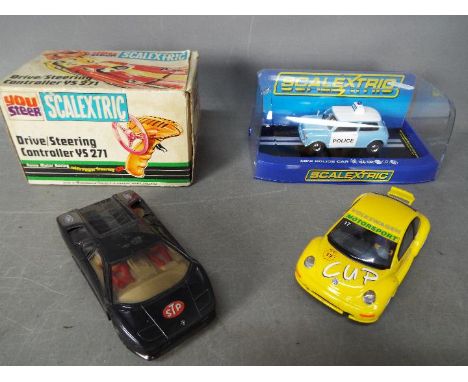 Scalextric - Lot of 4 Scalextric items including boxed # C3213 Morris Mini Police panda car, # YS 271 boxed vintage drive con