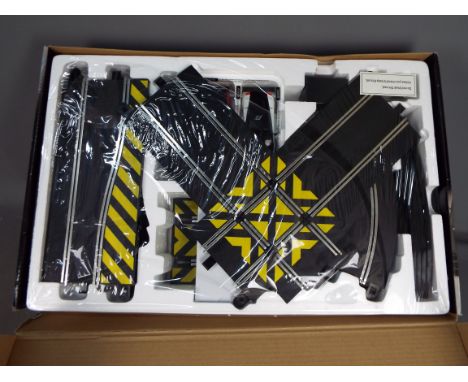 Scalextric - Boxed Scalextric # C1239 Need For Speed set with Nissan 350Z and Lamborghini Gallardo cars. The set has been ope