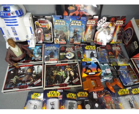 Hasbro - Waddingtons - Kenner - A mixed lot of Star Wars items including 21 carded figures, 4 jigsaw puzzles and other items 