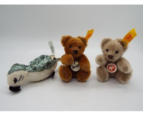 Steiff - two Steiff Bears #039256 / #6629335 with buttons and labels and a Steiff Parrot #034022 with button and white label,