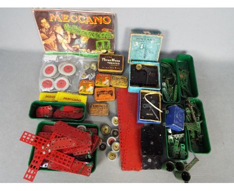 Meccano - Two boxes containing a quantity of vintage Meccano parts, some empty Meccano, branded tins, plus a Meccano no.1 ins