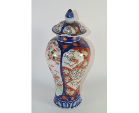 Japanese vase and cover, the blue ground with panels of flowers 31cm (Two chips to cover)