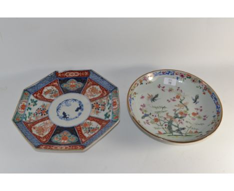 Late 18th Century porcelain dish with polychrome design of birds in branches together with a Japanese porcelain dish in Imari