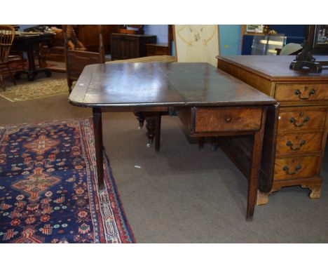 Early 19th century oak drop leaf table, raised on tapered gate legs, approx 121cm x 146cm extended