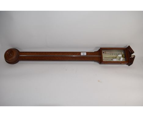 Stick barometer and temperature gauge in typical light oak frame with inlaid stringing