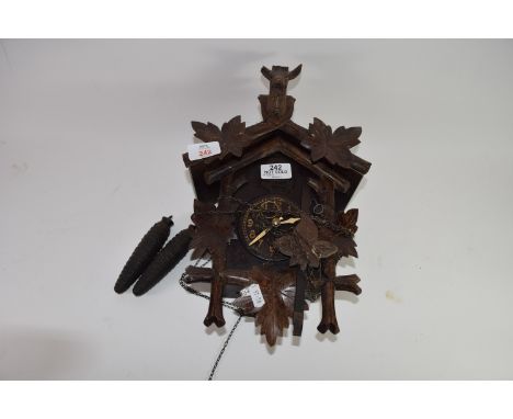 Early 20th century Black Forest cuckoo clock, case height max 31cm, typical decoration mounted with a deer head (a/f)