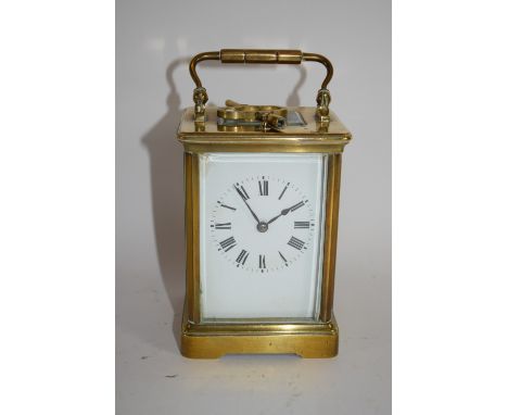 Good quality brass and glass cased Carriage Clock