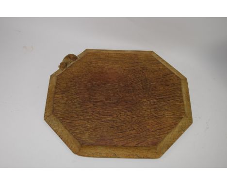 Robert Thompson mouseman chopping board of octagonal form with carved mouse to one side