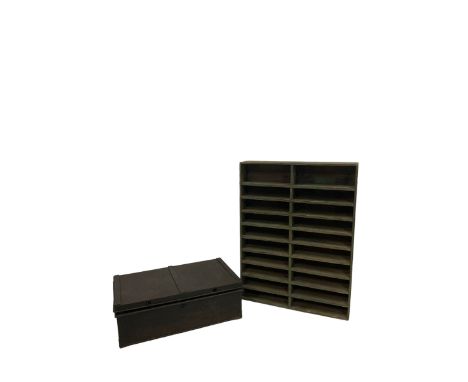 One metal storage box with green shelf unit