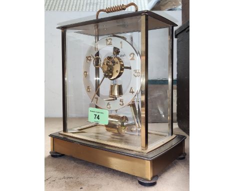 A 1950's mantel clock in 4 glass gilt metal case, by Keininger &amp; Obergfell 