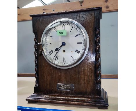 A large 1930's oak cased mantle clock and a similar smaller clock 