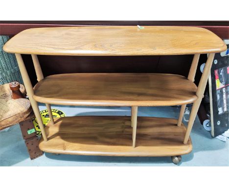 A vintage Ercol shelving unit, room divider, with oval shelf dividers on the bottom shelf.&nbsp; Height 72cm x Length 84cm.&n