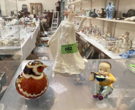 A Royal Worcester figure 'China', modelled by F G Doughty; a Royal Crown Derby bird with silver stopper LVII (2nd); a Royal D