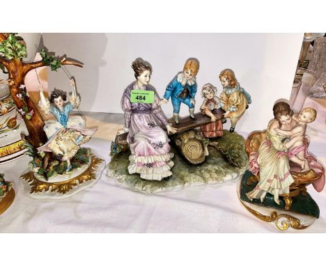 A large Cappodimonte group: Woman &amp; Children on a Seesaw, hand painted decoration, signed Tychtosca, length 26cm; another
