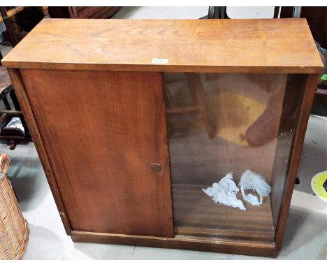 A small 1960's teak side cabinet with one glazed and one panelled door; a similar telephone table and tile top coffee table 