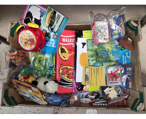 A Corgi James Bond car, a miniature camera, a selection of cartoon collectables 