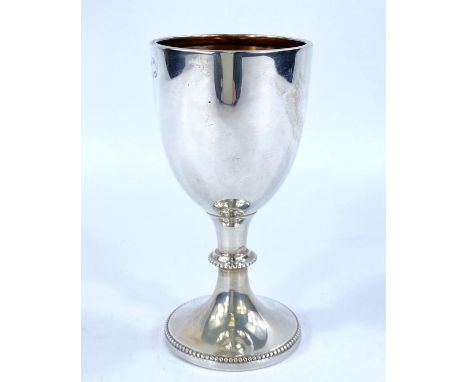 An egg cup on collared pedestal base, with beaded decoration, Chester 1926, 1.6 oz 