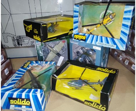 Four boxed Solido helicopters and two boxed diecast models&nbsp; of military planes 