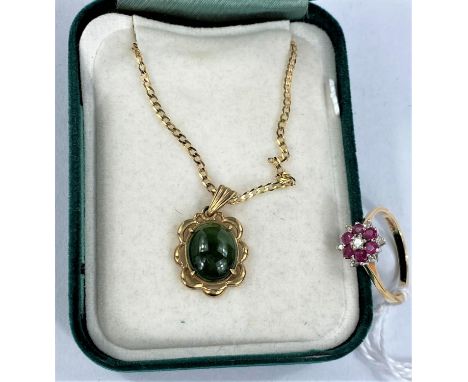 A yellow metal pendant set jade coloured stone on 9 carat hallmarked gold fine chain, 3.2 gm gross; a 9 carat hallmarked gold