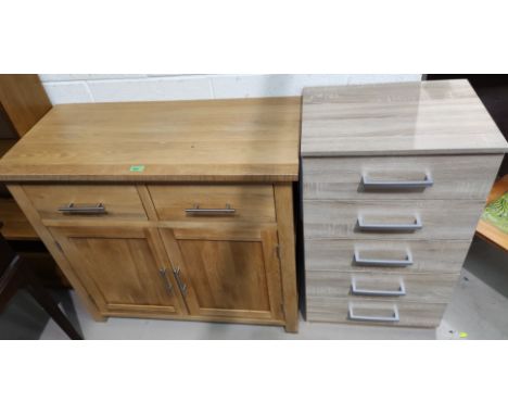 A modern light oak side cabinet of 2 drawers and double cupboard 