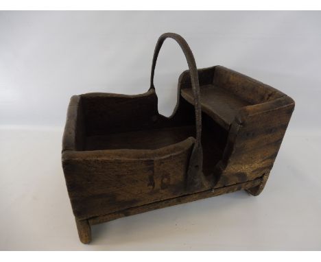 A 19th Century folk art figured elm and wrought iron farrier's travelling toolbox, 14 1/4" w x 12" h x 10 1/2" d.