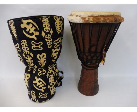 A Kambala African drum in case, 25 1/2" h.
