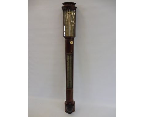 A George III mahogany stick barometer by J. Newman of London. 