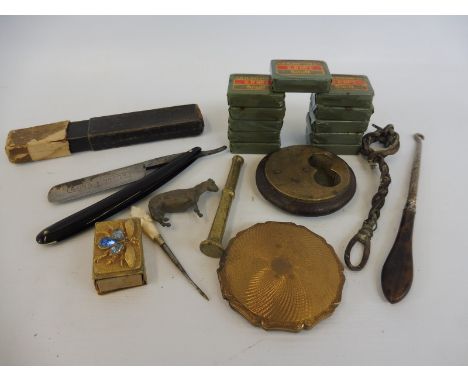 A small selection of collectables including a tortoiseshell handled button hook, a Stratton compact and 11 unopened packets o