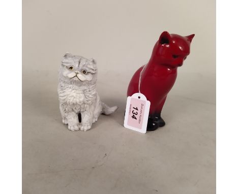 A Royal Doulton flambe cat plus a Royal Worcester 'Blue Persian', dated 1978
