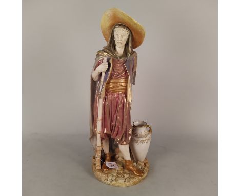 A Royal Worcester figure of an Eastern European huntsman signed 'Hadley' (hair crack to base), 22" high