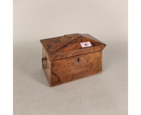 An early Victorian rosewood sarcophagus shaped tea caddy with brass ring handles