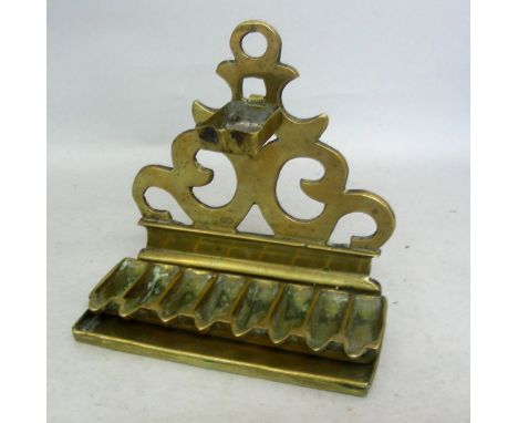 Important Brass Hanukkah Menorah, Southern Italy, Circa 1700, Judaica. The open work triangular scroll backplate on molded ba