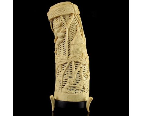 Carved African Ivory Lamp Shade. Hand carved with typical African scenes. Set on a wooden base raised on three ivory supports