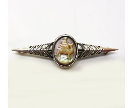 Silver and Mother Of Pearl Man On Camel Brooch, Palestine, Circa 1920. Centered with an oval hand carved mother of pearl. 1.7