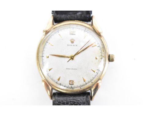 A Rolex Precision, manual wind, gents, 9ct gold wristwatch, circa 1940/50s, having 'teardrop' lugs, dial with baton markers a