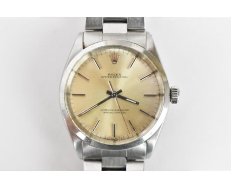 A Rolex Oyster Perpetual, chronometer, automatic, gents, stainless steel wristwatch, circa 1966, having a silvered dial with 