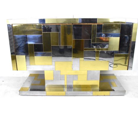 A Paul Evans 'Cityscape' chromed steel and brass sideboard, produced by Directional, circa 1970, having two cupboard doors an