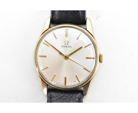 An Omega, manual wind, gents, 9ct gold wristwatch, circa 1959, having a silvered dial with centre seconds and baton markers, 