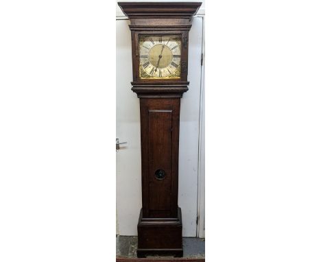 An early 18th century oak cased 30 hour longcase clock, having a moulded and stepped cornice, the square dial signed 'John Ma