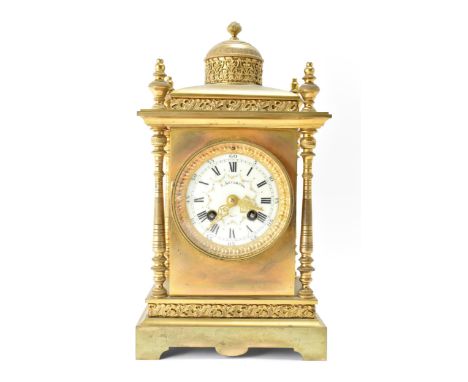 A late 19th/early 20th century French gilt metal 8 day mantle clock, the enamel dial signed 'S.Leighton, Paris' within floral