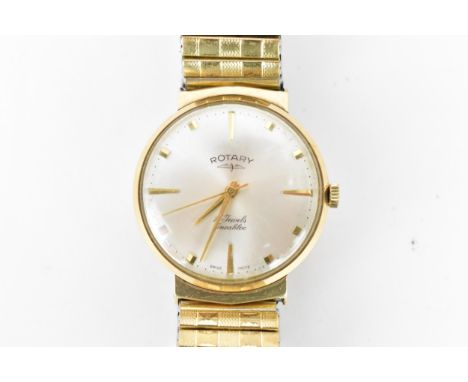 A Rotary, manual wind, gents, 9ct gold wristwatch, circa 1960s, the silvered dial having gilt baton markers, on a later gold 