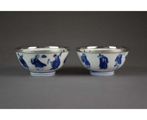 A pair of Chinese blue and white 'immortals' bowls, Kangxi six-character marks and of the periodOf rounded form, each decorat
