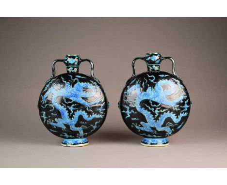 A pair of Chinese Fahua moon vases, Yongle archaic script marks but probably laterOf circular shape with garlic head rims and