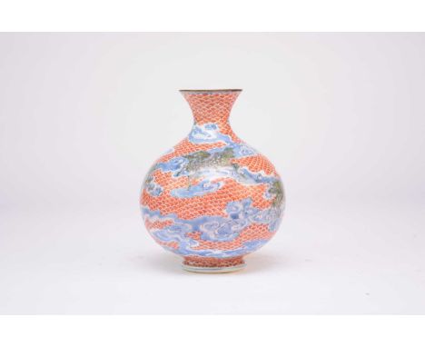 A Japanese Imari vase by Kayama, Meiji era, of globular form with short trumpet rim, decorated with kirin in flight amid clou